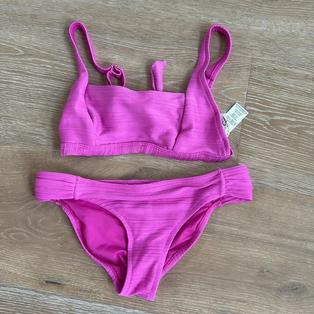 Jessica Simpson pink 2 pc swimsuit in size Small.